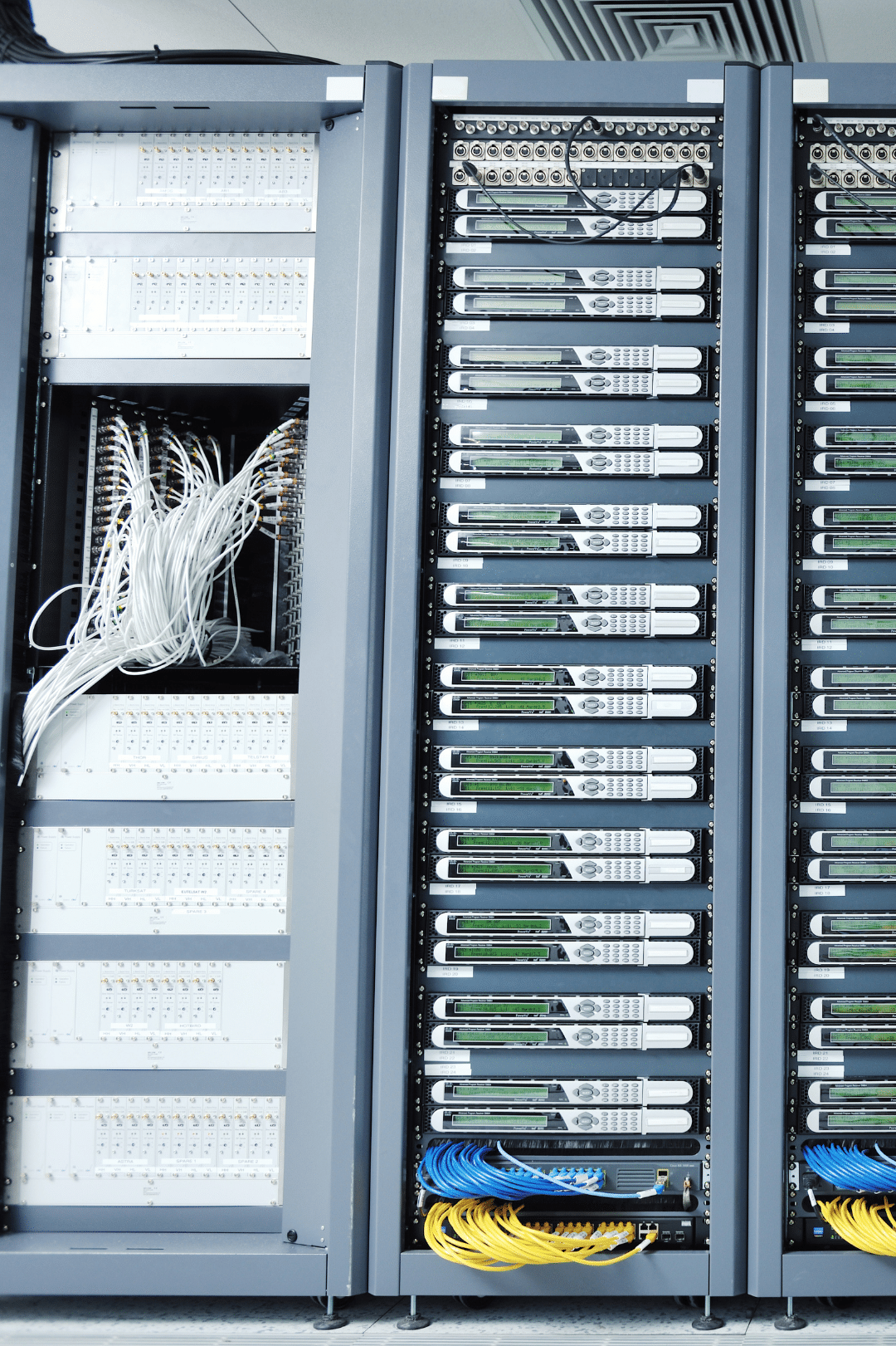 Data center server racks with network equipment - on-premise phone system failover infrastructure